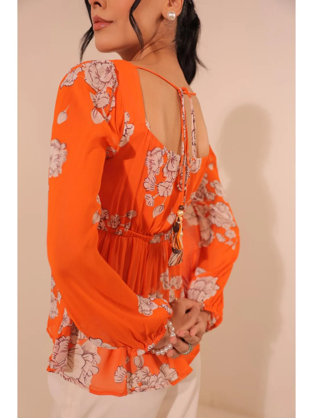 modish viscose georgette floral printed sweet heart center gathered busted, full puff sleeve, back tie-up top. - Orange